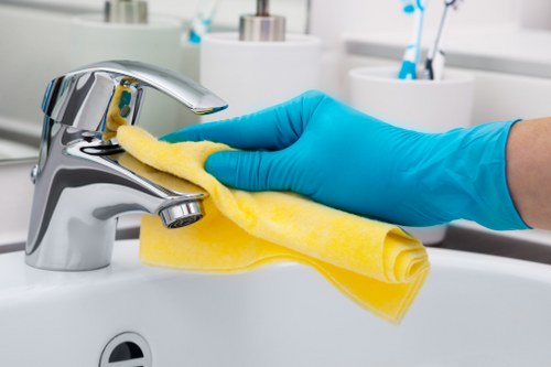 Local after builders cleaning team working in E2 apartment